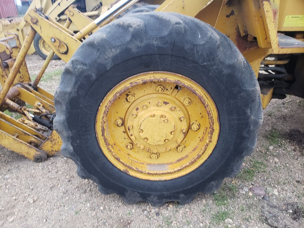 CAT 910 Tire and Rim for Sale