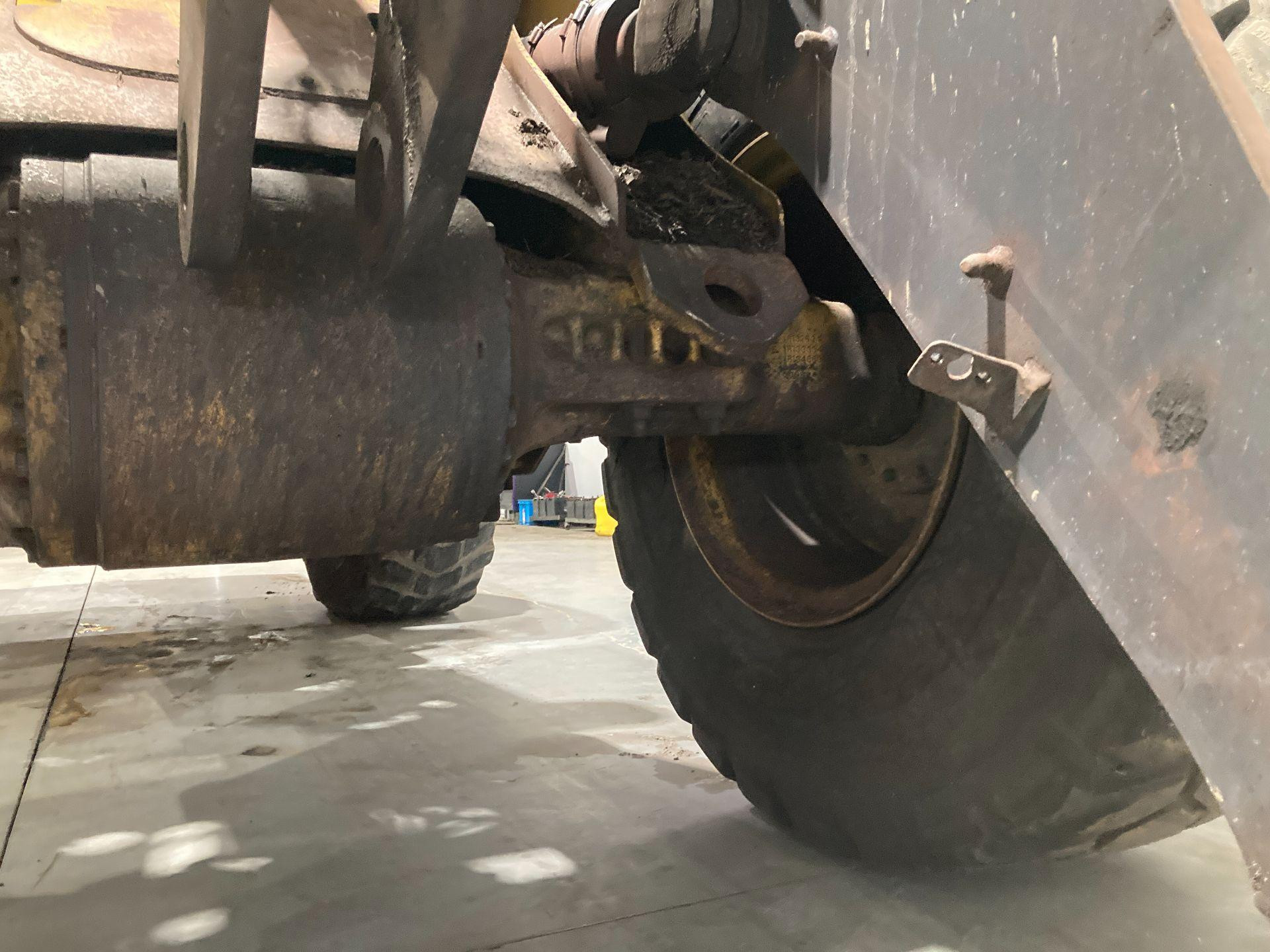 AT344032 | John Deere 544J Axle Assembly for Sale