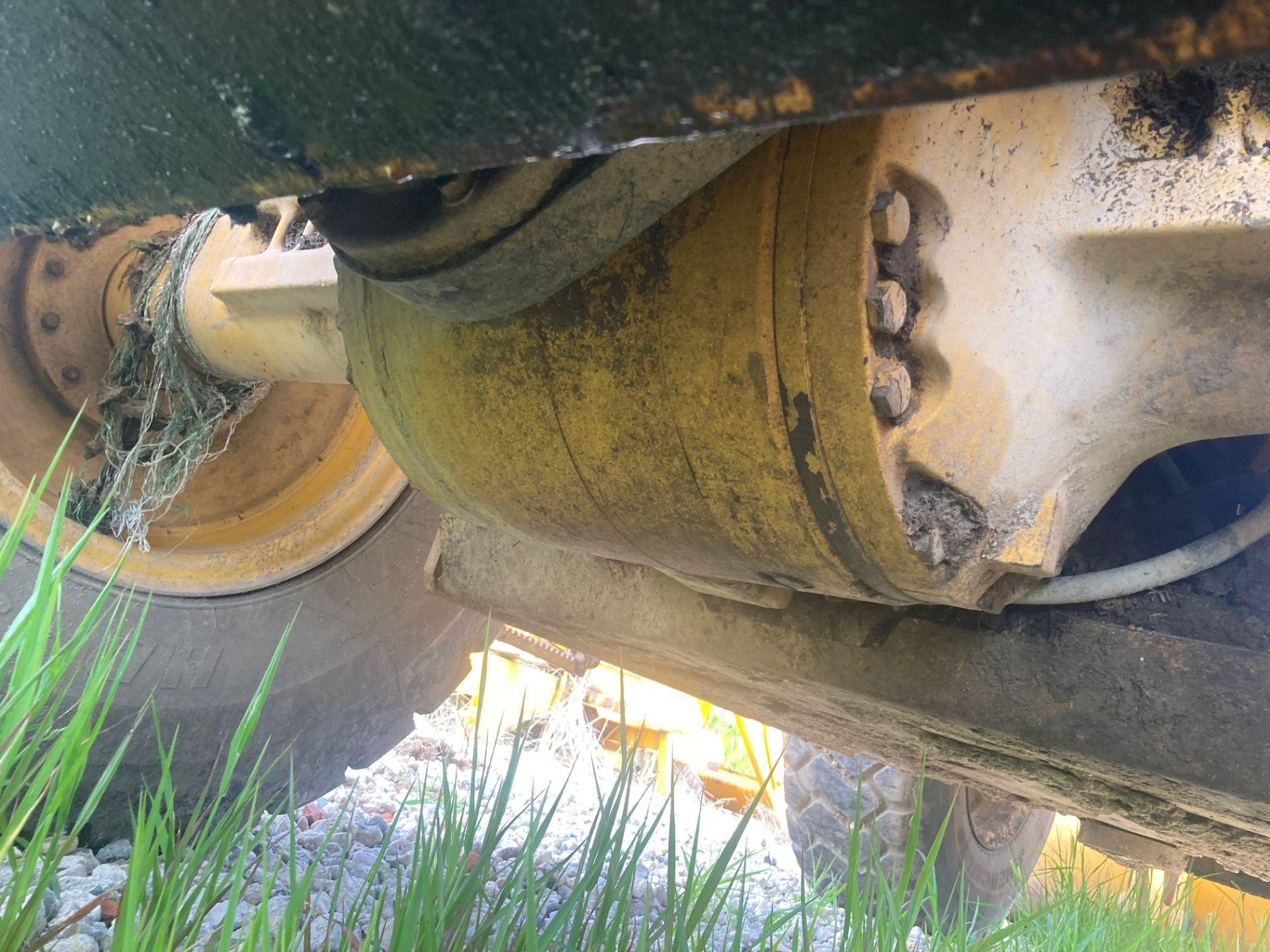 RE164483 | John Deere 624H Axle Assembly for Sale