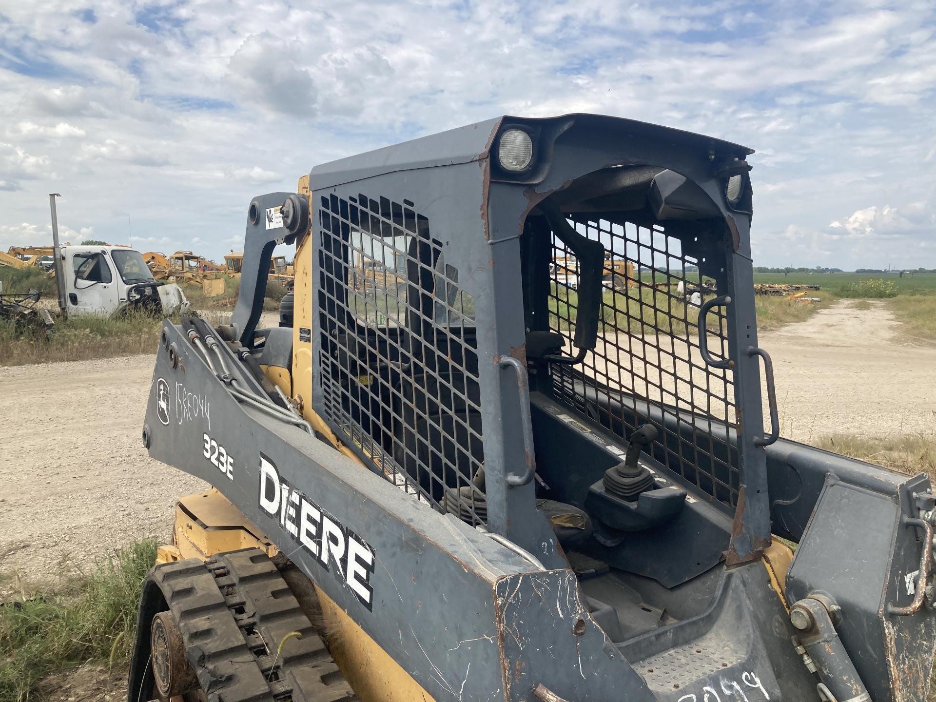 AT555214 | John Deere 323E Cab Assembly for Sale