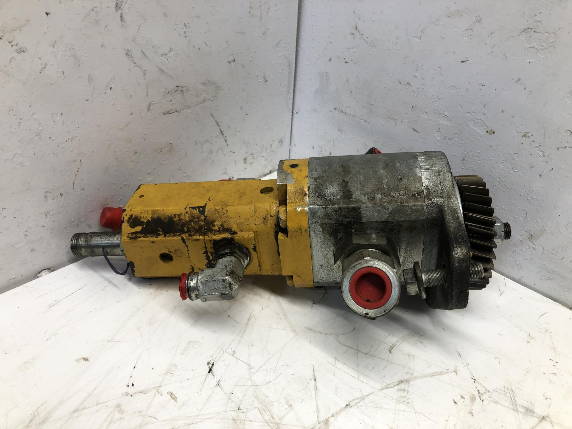 AT384043 | John Deere 524K II Hydraulic Pump for Sale