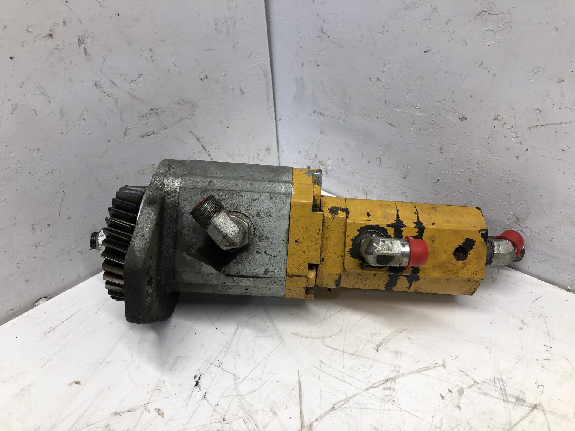 AT384043 | John Deere 524K II Hydraulic Pump for Sale