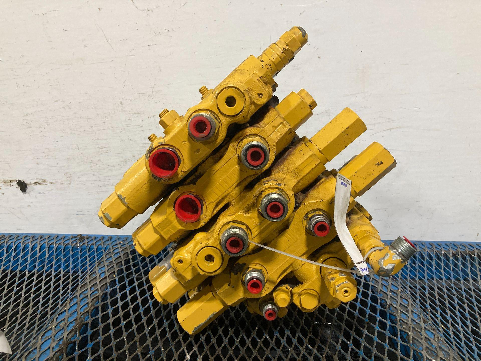AT300583 | John Deere 310SG Hydraulic Valve for Sale