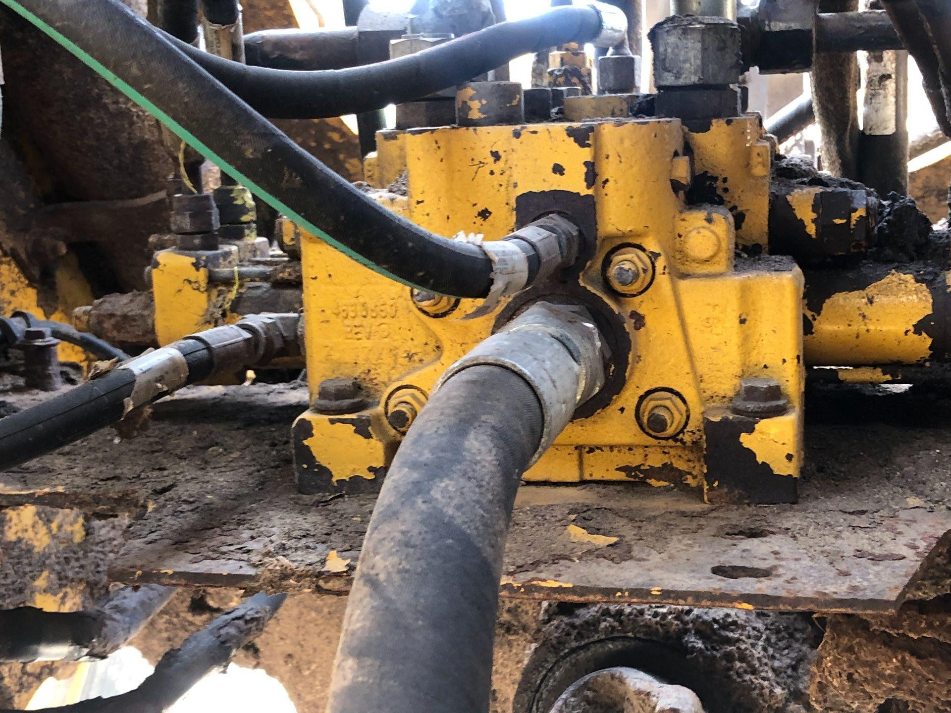 AT308388 | John Deere 544K Hydraulic Valve for Sale