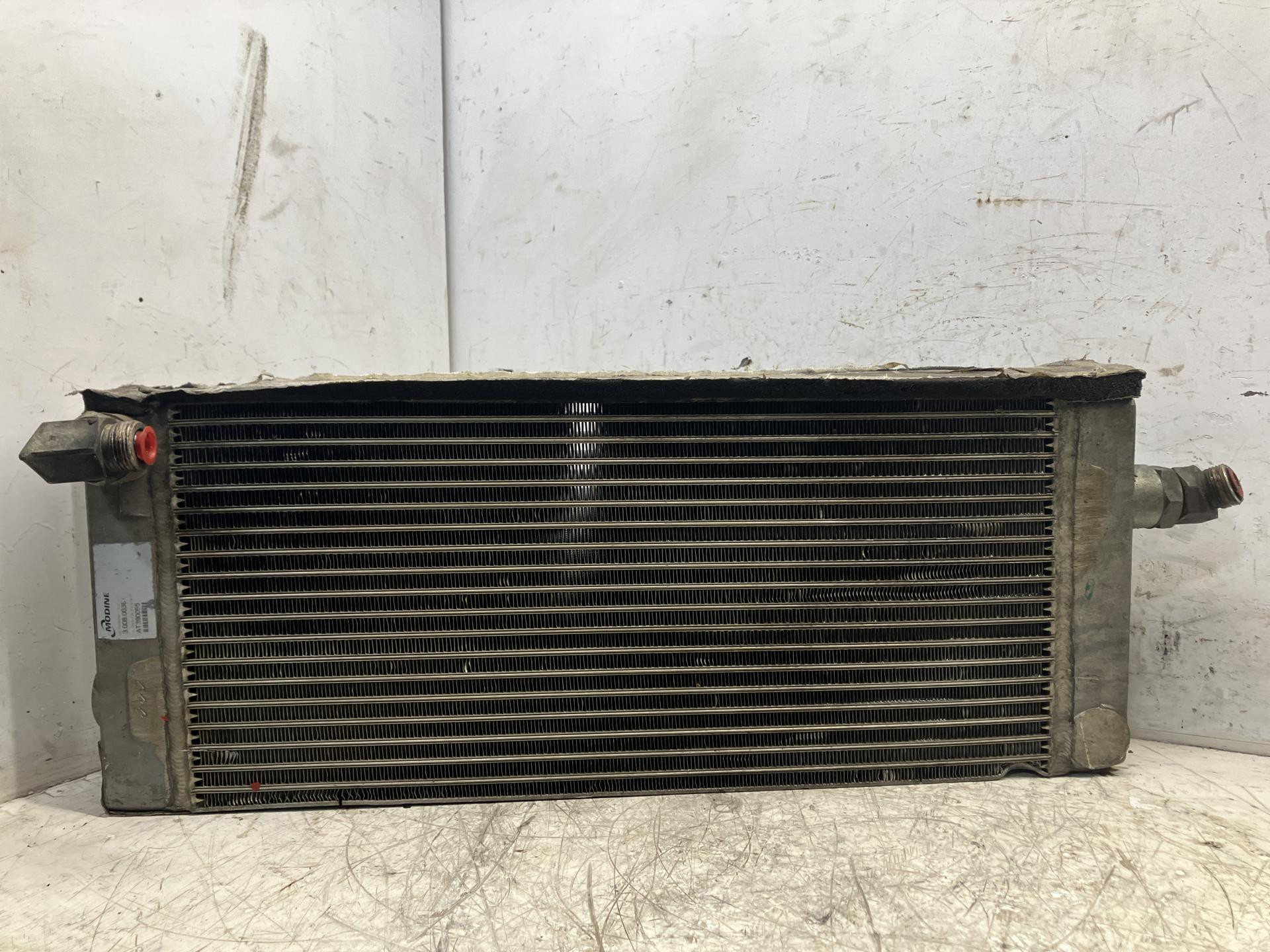 AT390055 | John Deere 319D Oil Cooler for Sale