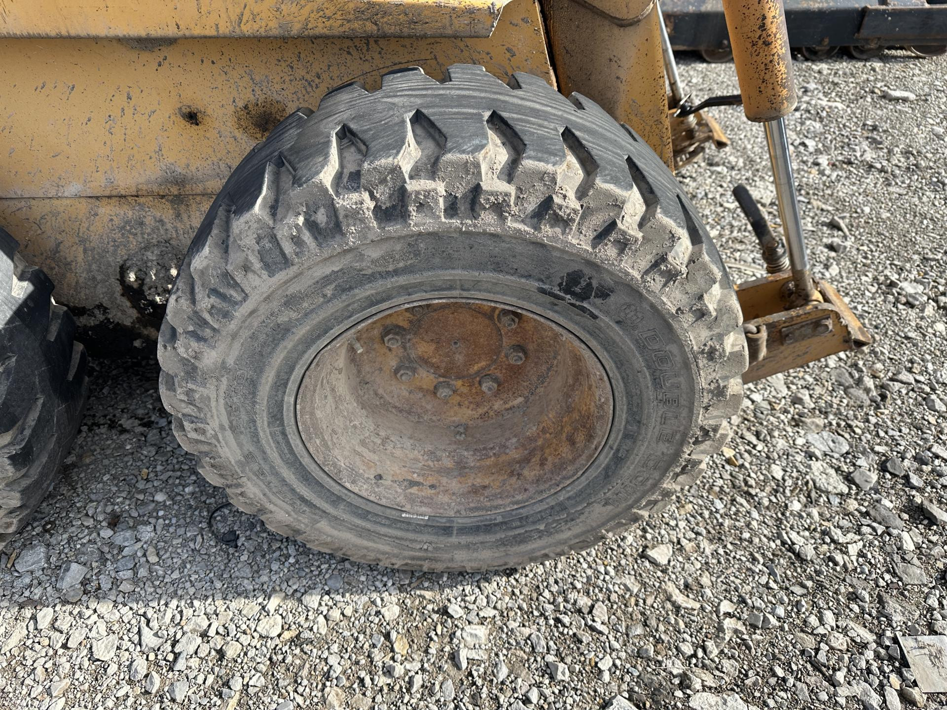 Case 1845C Tire and Rim for Sale