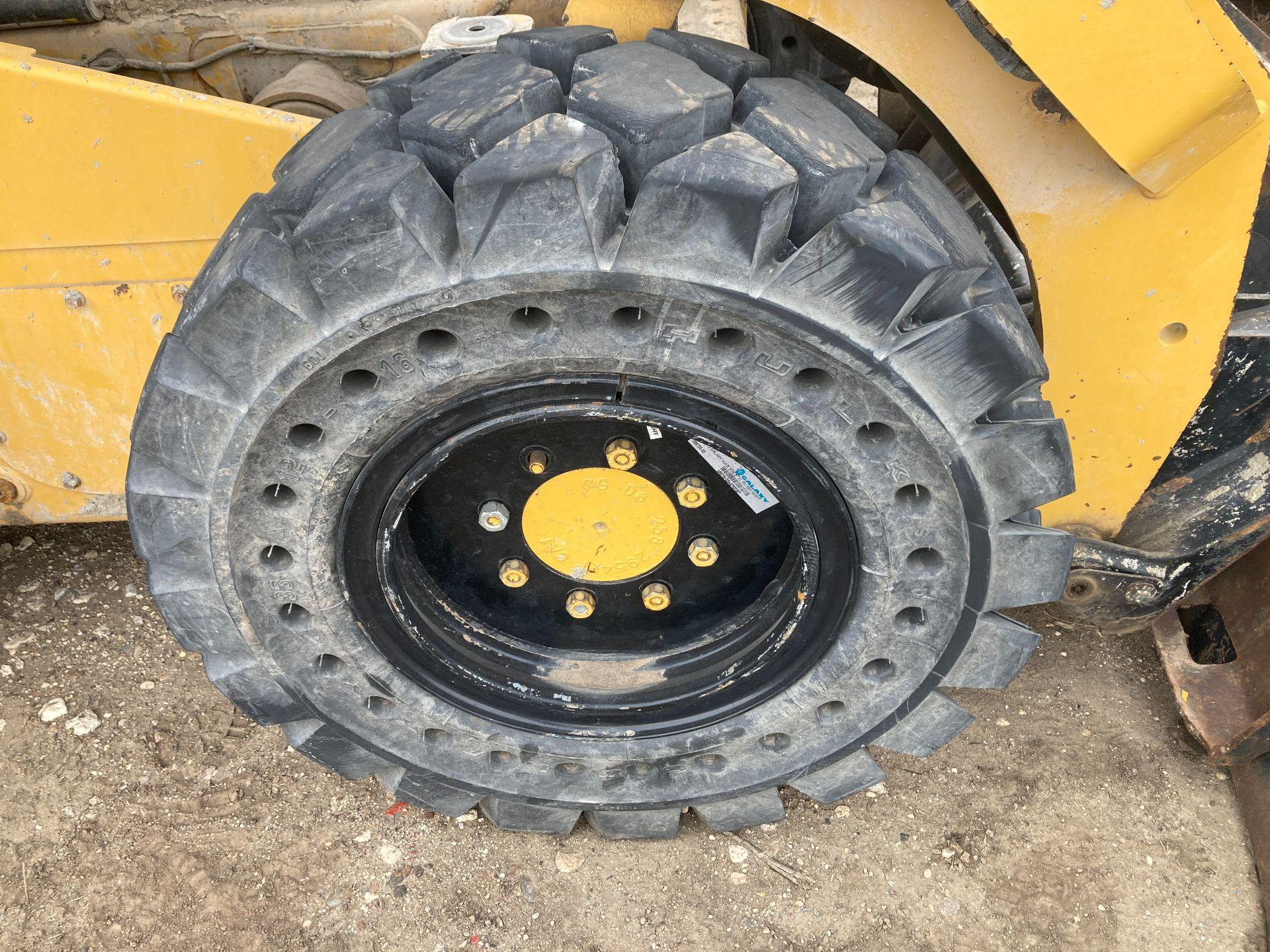 CAT 262D Tire and Rim for Sale