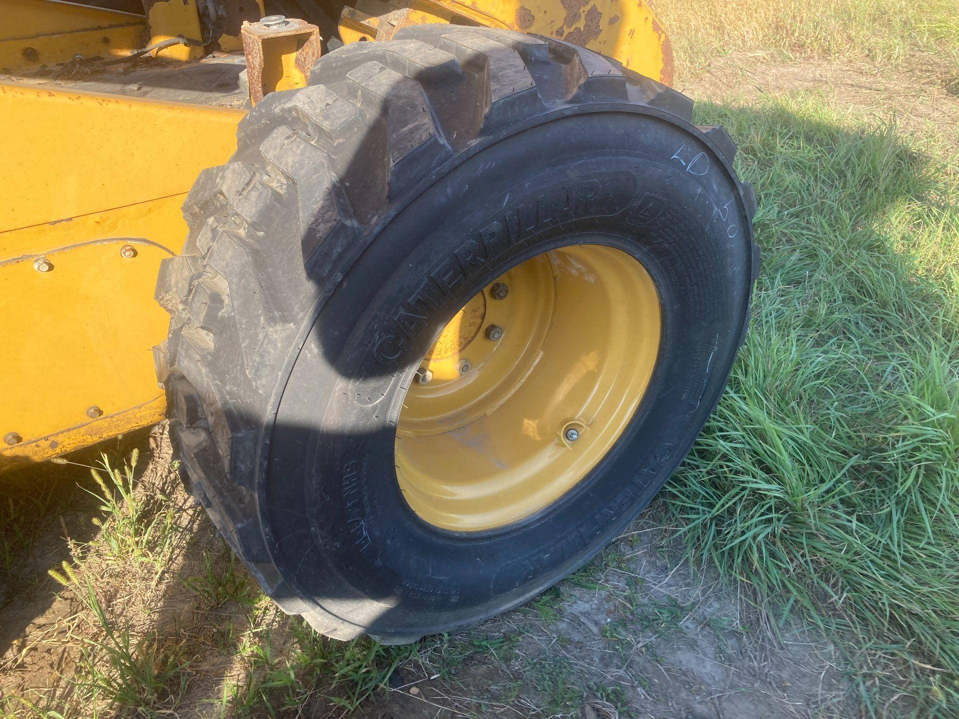 CAT 272D XHP Tire and Rim for Sale