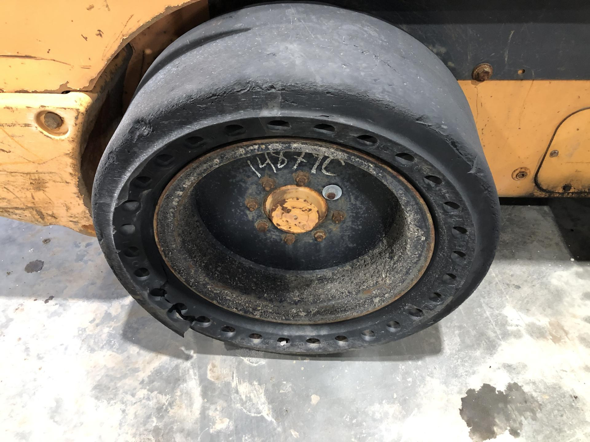 Case SV300 Tire and Rim for Sale