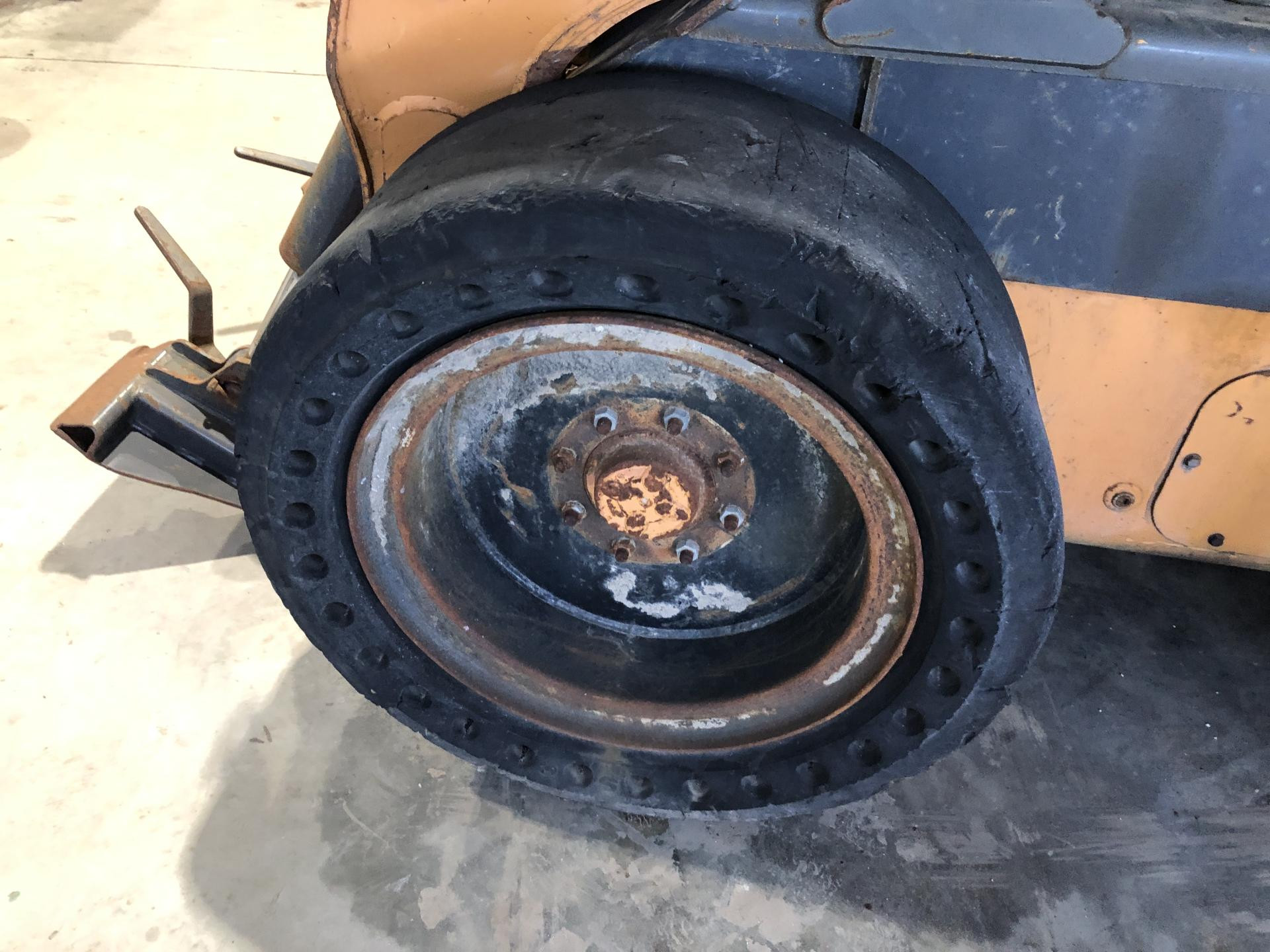 Case SV300 Tire and Rim for Sale