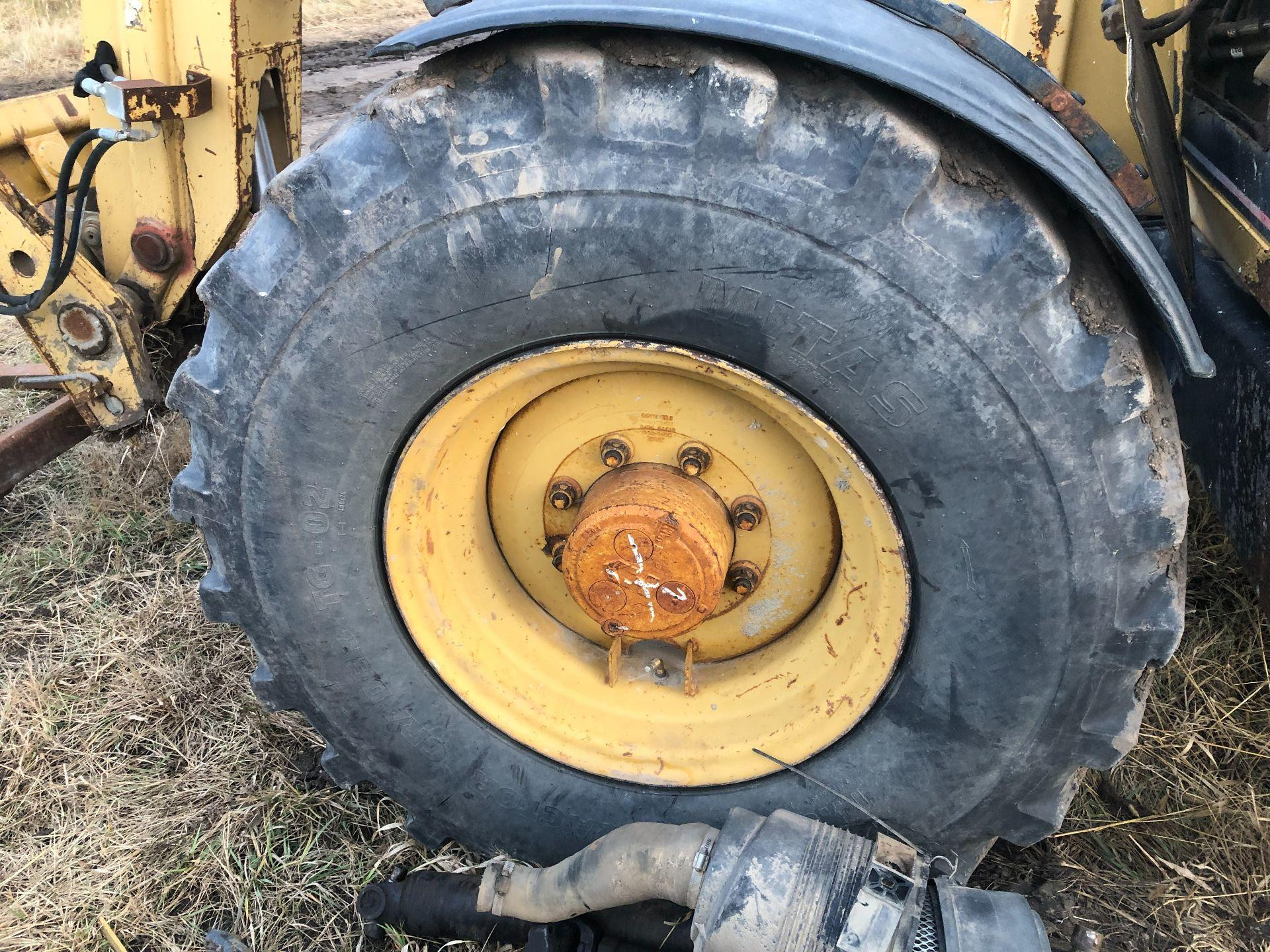 8I-5920 | CAT TH63 Tire and Rim for Sale