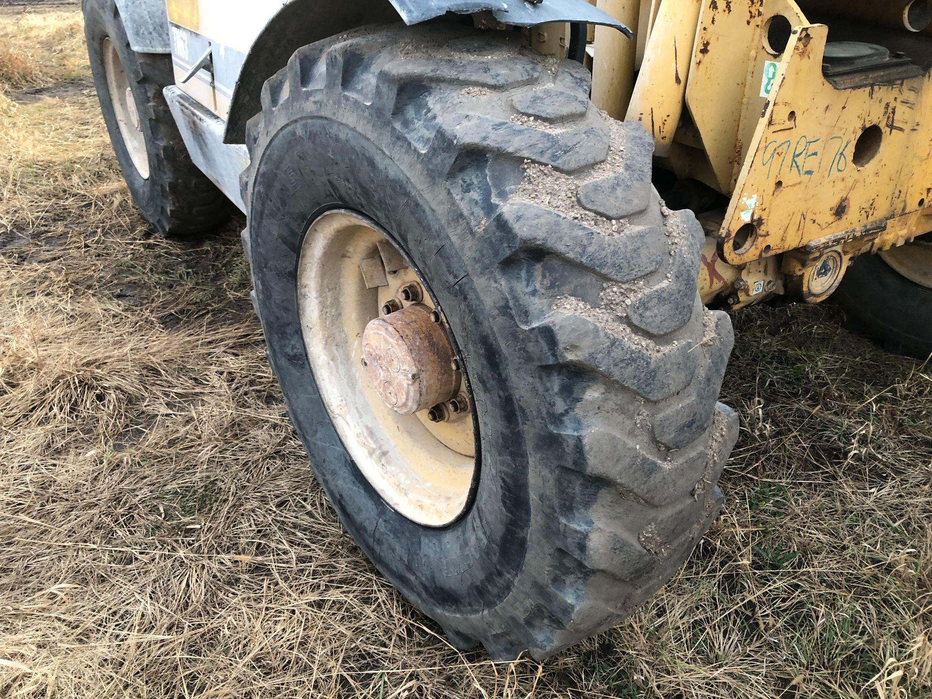 CAT TH63 Tire and Rim for Sale