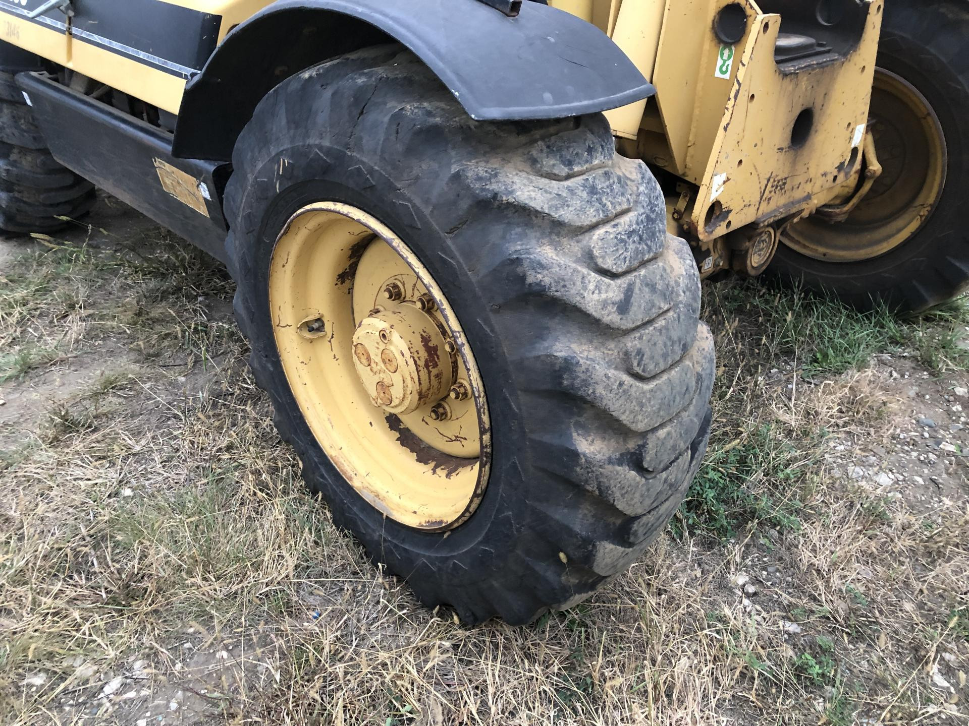 8I-3110 | CAT TH63 Tire and Rim for Sale