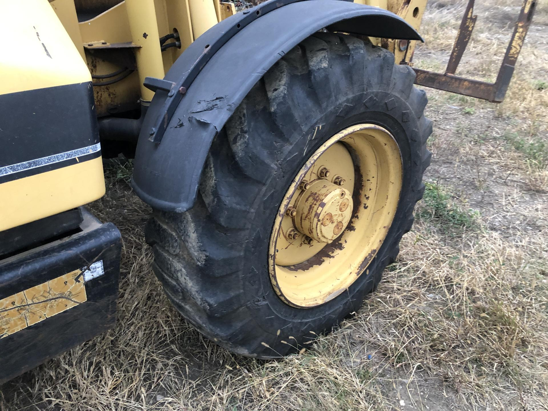 8I-3110 | CAT TH63 Tire and Rim for Sale