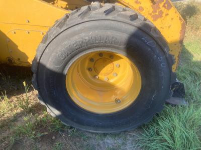 CAT 272D XHP Tire and Rim for Sale