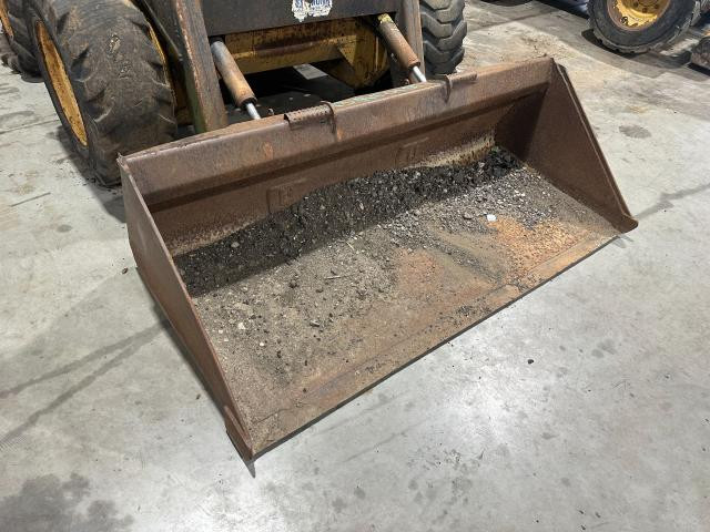 1993 New Holland L785 Skid Steer Attachments