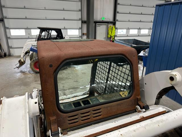 2010 Bobcat T190 Back Glass: P/N 6717874