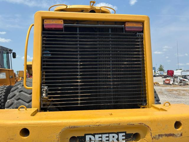 1997 John Deere 744H Grille: P/N AT210619