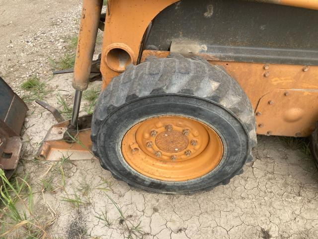 2002 Case 40XT Left Tire And Rim: P/N 408450A1