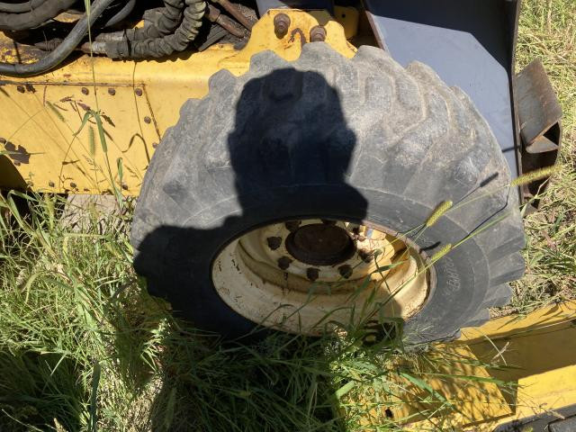2001 New Holland LS180 Right Tire And Rim: P/N 86109056DS