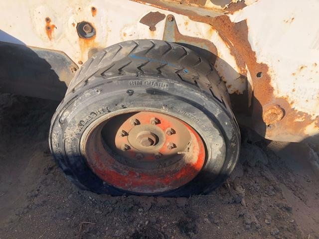 2006 Bobcat S185 Left Tire And Rim: P/N 7232567