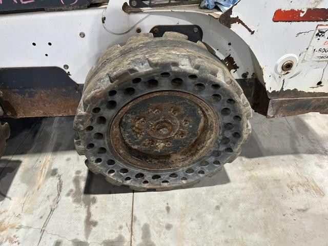 2015 Bobcat S570 Left Tire And Rim